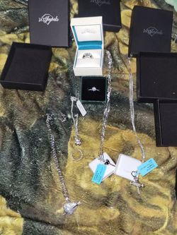 3 24inch sterling silver chains and charms
