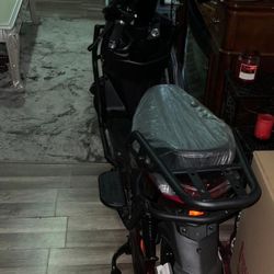 For sale: a brand-new electric bicycle, originally priced at $1,200, now available for the reduced price of $800.