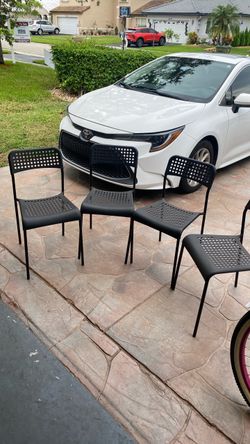 Set of 4 Black Metal Perforated Chairs