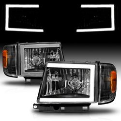 TOYOTA TACOMA 2WD (W/ PRERUNNER) 97-00 / 4WD 98-00 HEADLIGHTS BLACK (W/SIDE MARKERS) (W/ C LIGHT BAR)