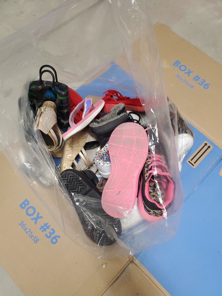 Bag Of Used Girl And Boy Shoes