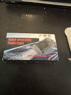 Hand Pressing Flash Light