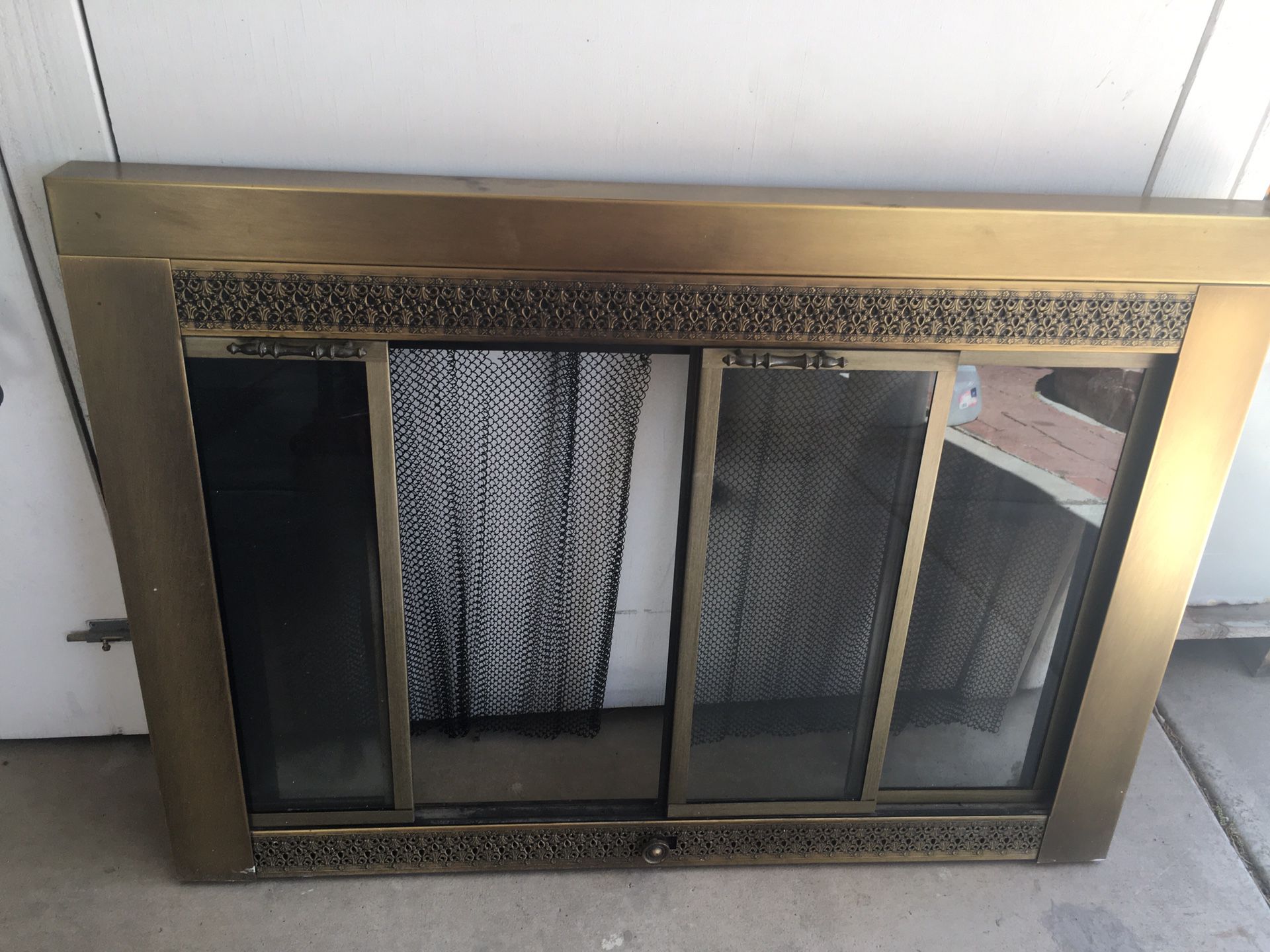 Nice Brass fireplace screen with glass and screen