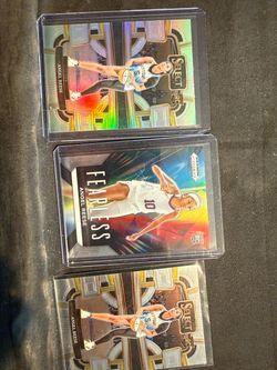 Angel Reese rookie cards lot of three. Panini select Silver prism Panini select, and Panini prism fearless.  NM or better