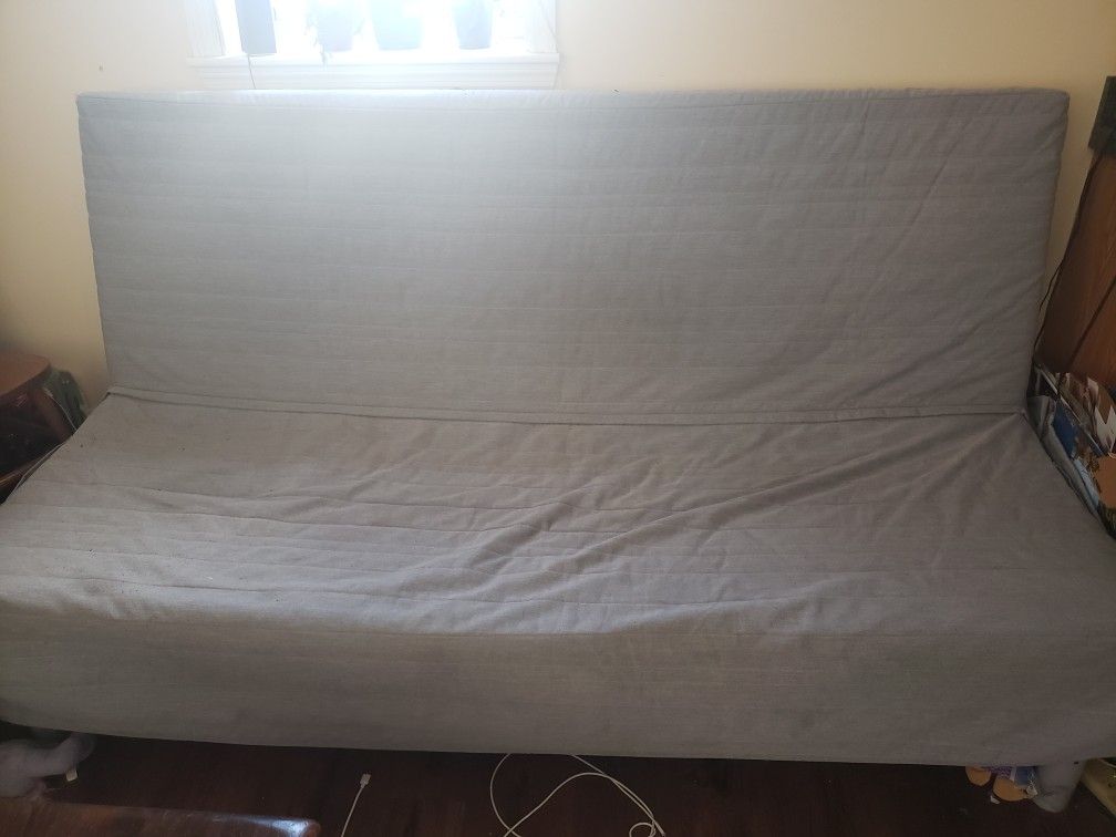 IKEA futon 7 feet long with cover and pillows