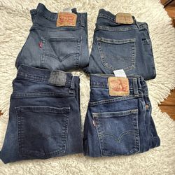 Take all 4pcs Levi’s jeans  Size 32x32  Flaws on the last picture, last pants have little two holes in it