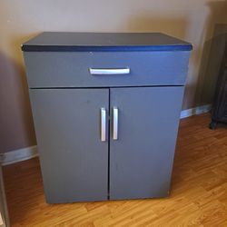 Gray Storage Cabinet With Drawer And Shelf
