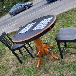 Bar Table And 2 Stools Wth h a Rug 