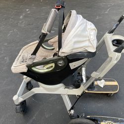 Orbit Baby Stroller And Car Seat And Skateboards