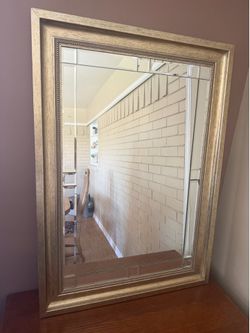 Gold mirror