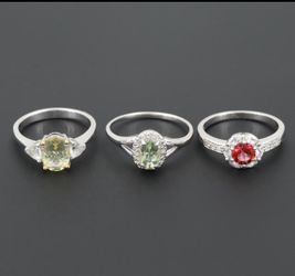 Sterling-silver-amblygonite-apatite-topaz-zircon-and-synthetic-bixbite-rings