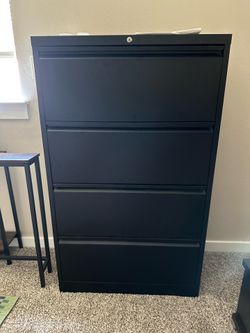 Black metal filing cabinet