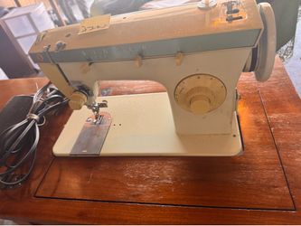 Singer sewing machine an table