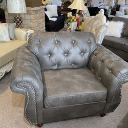 Gray chesterfield chair