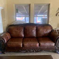 Leather Couches And Table 