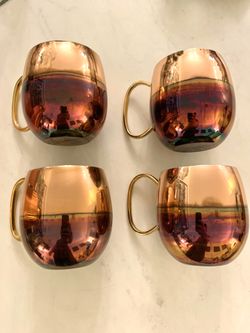 4 Anthropologie Moscow Mule mugs.