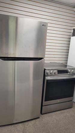 New LG refrigerator and used Range stove work great conditions delivery