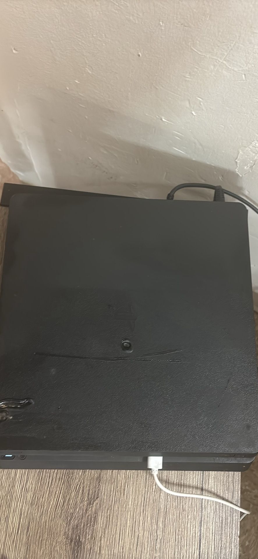 PS4 Comes With Controllers Everything Works Only Thing Wrong Is it Has Incent Burn Marks From Last Person Who Had It