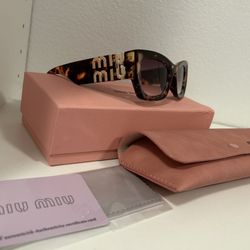 miumiu women’s Sunglasses MU 09WS 
