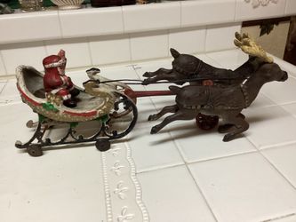 Antique Iron Sleight with Reindeers and Santa