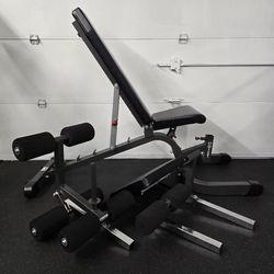Hoist Fitness weight bench with preacher leg curl extension $500

