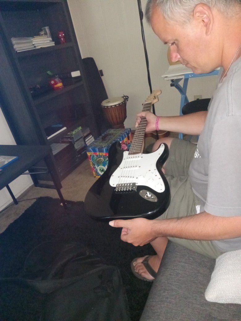 Fender Stratacaster Electric Guitar, Case And  Amp