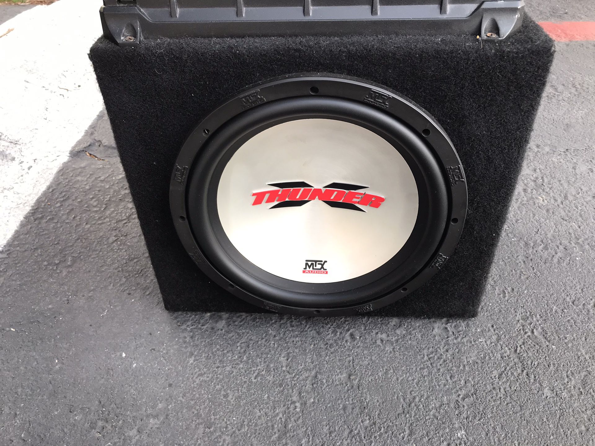 12 inch thunder MTX subwoofer. And a 2000 kenwood Amp.