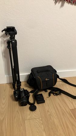 D3300 Nikon Camera plus bag, tripod, charger and cords.