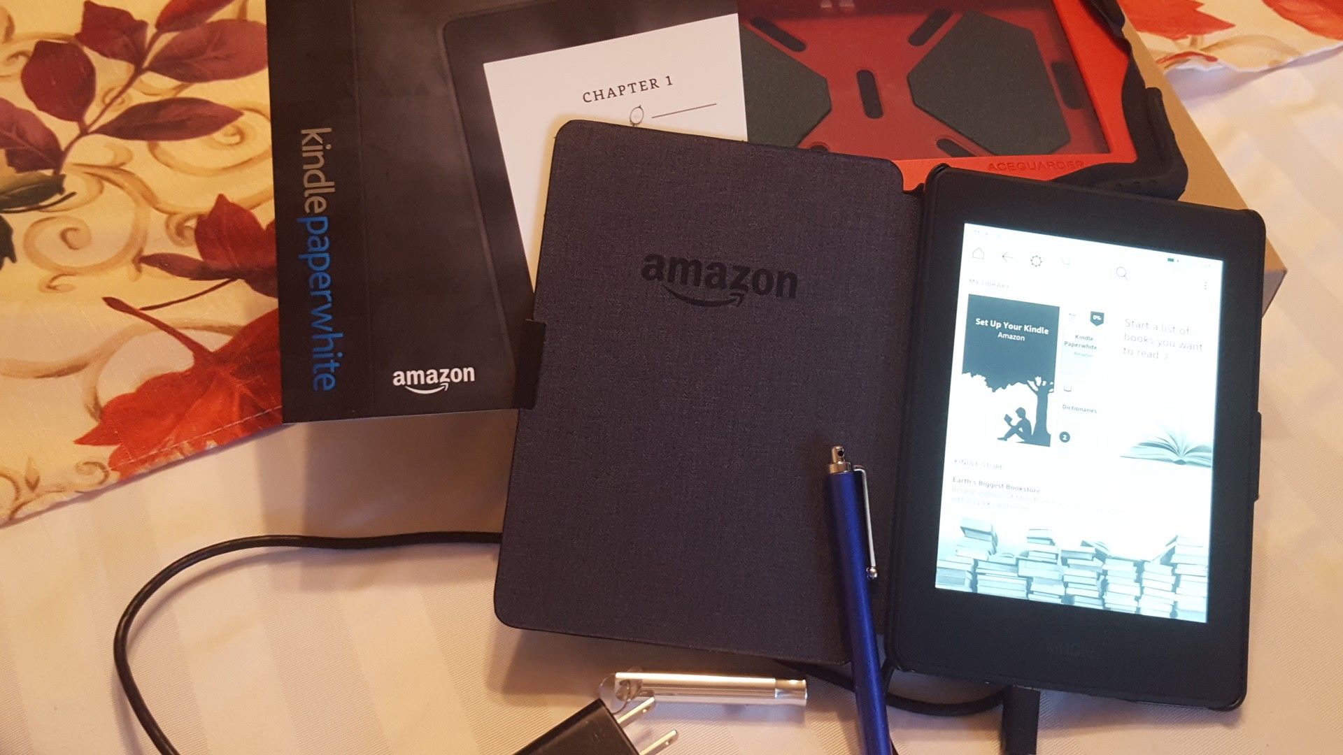 Kindle paper white with Aceguarder cover and accessories