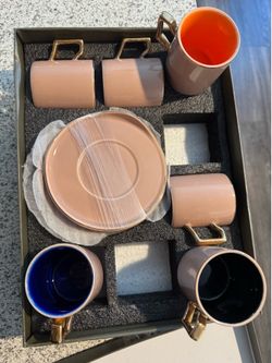 Ceramic cups and saucers