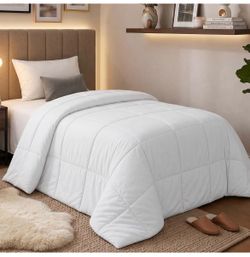 NEW in box down alternative comforter. Twin