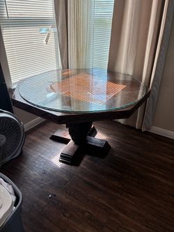 Heavy duty wooden kitchen table with solid glass