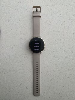 Garmin Venu 3S smartwatch in French Gray with Soft Gold bezel.