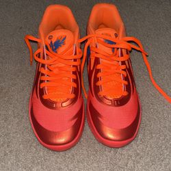 Orange lámelo ball basketball shoes
