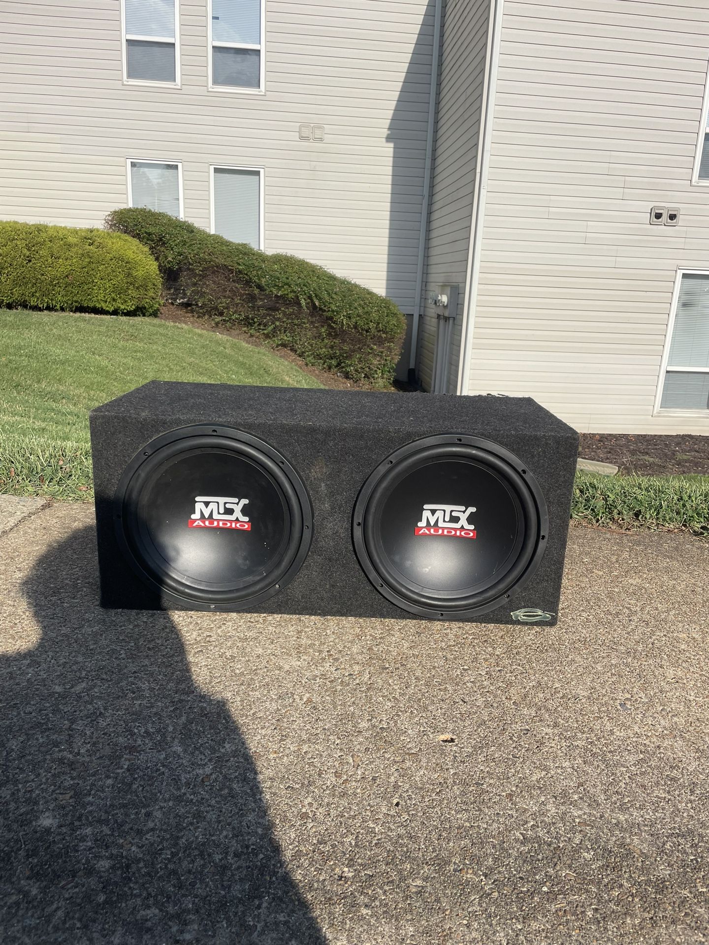 2 12inch Subwoofers With A 1500 Watt Planet Audio Amp