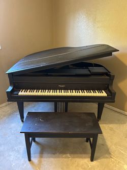 Kohler and chase baby grand piano