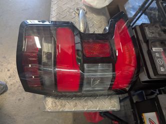 Nissan frontier left side teill light oem fit 2022 2023 2024 2025