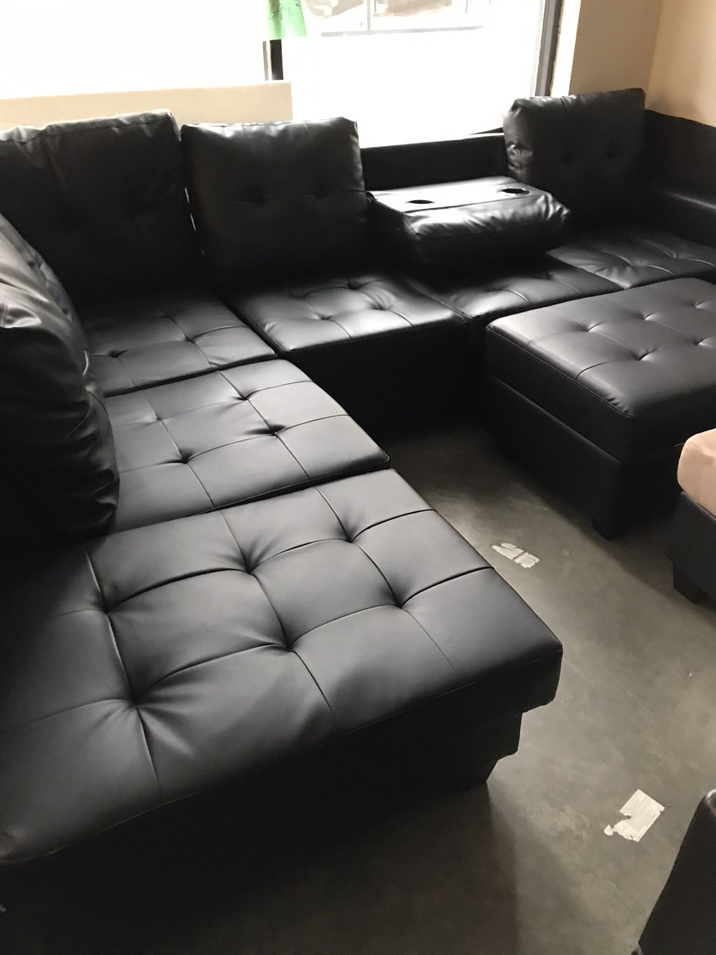 Black Leather Sectional With Ottoman 