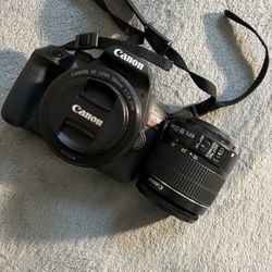 T7 Rebel With Two Lenses Must Go “ Moving 