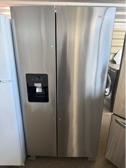 Whirlpool side by side stainless steel refrigerator