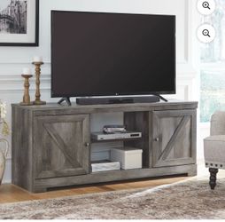 New in box Wynnlow TV stand (unopened)