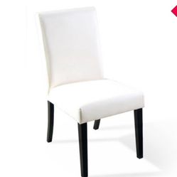 Four white chairs
