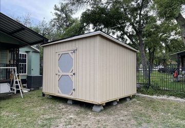 10x12 slanted shed/ storage w/1 shed door, 2 free shelves