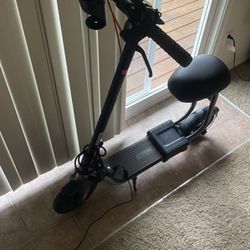 Electric scooter with seat