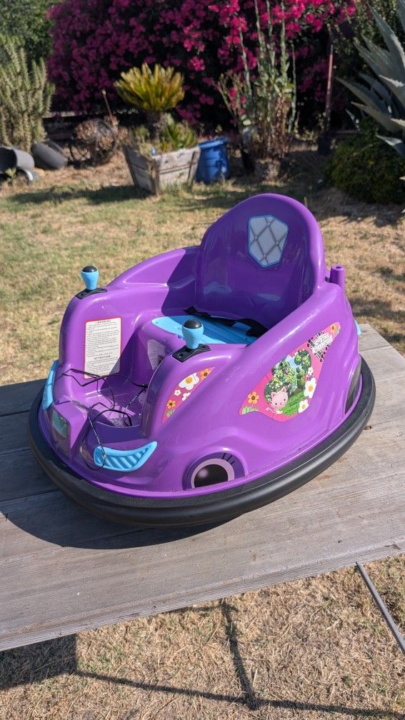 Gabby’s Dollhouse Electric Bumper Car for Kids – Purple Ride-On Toy (Needs Battery)