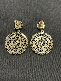 Women’s Round Clip Earrings in Bronze Color.