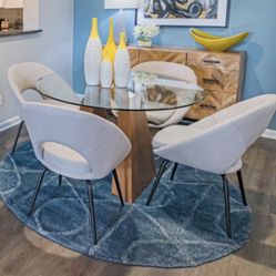 modern round glass dining table with a solid wood pedestal base (seats 4).