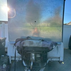UTILITY TRAILER WITH ATTACHED GENERATOR 