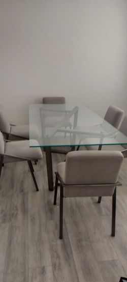 Modern glass top dining table and 6 chairs