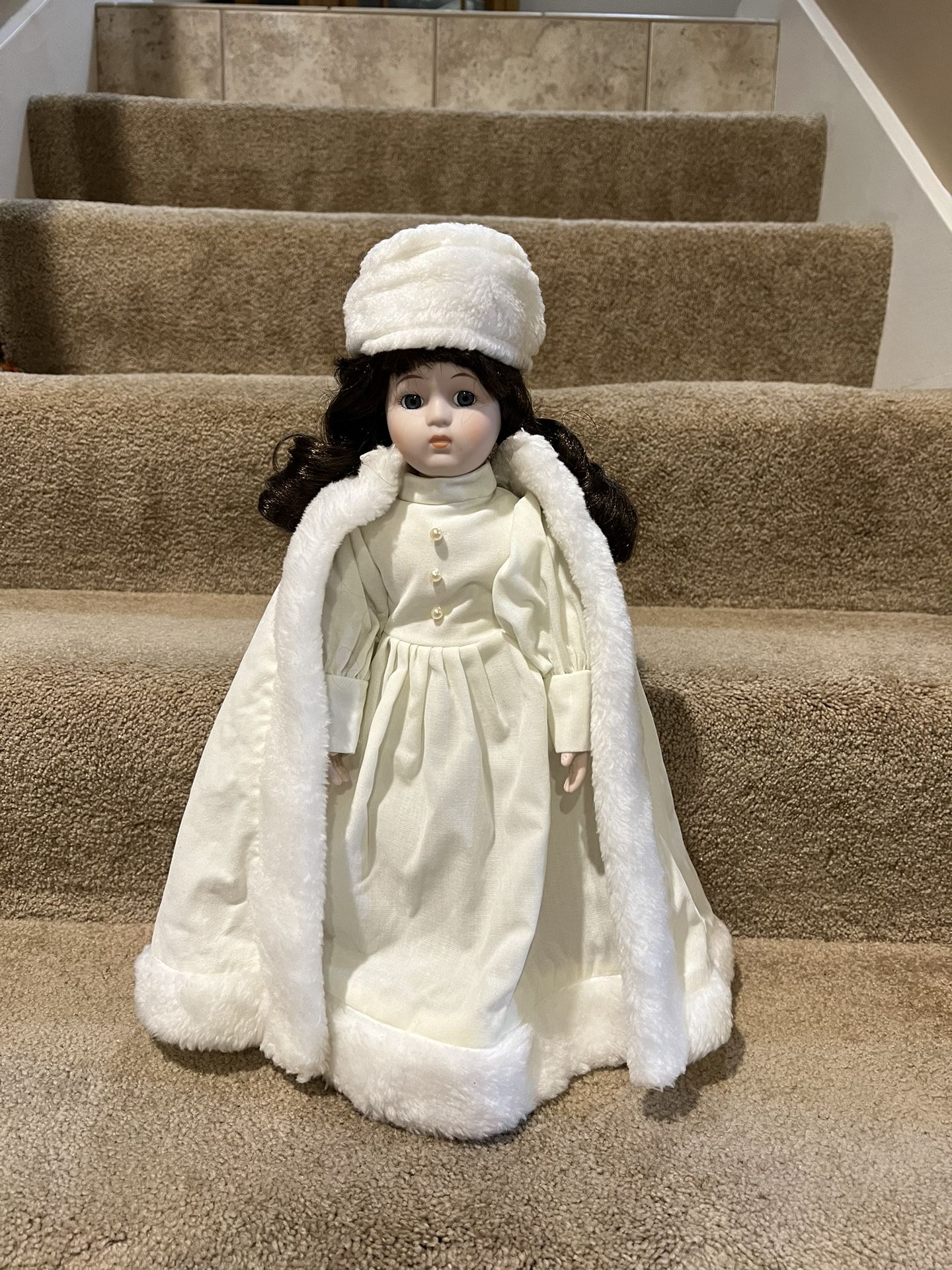 Winter porcelain Doll 17” tall w stand